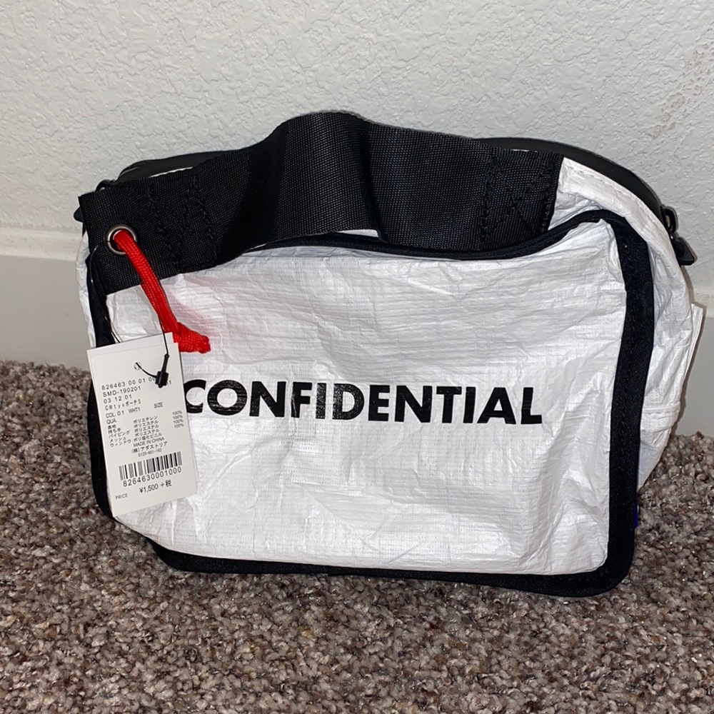 White confidential mini bag